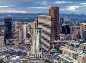 downtown Denver skyline, mountain background