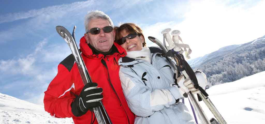 Older couple skiing